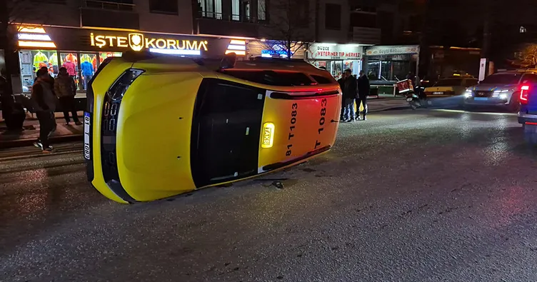 Sıkışan trafikte kontrolden çıkan taksi yan yattı